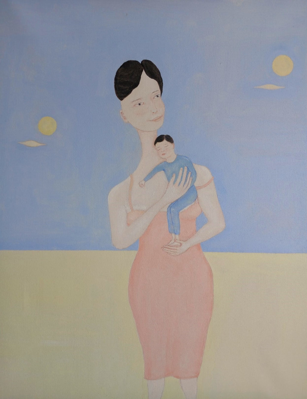 Ayu and her child in her arms