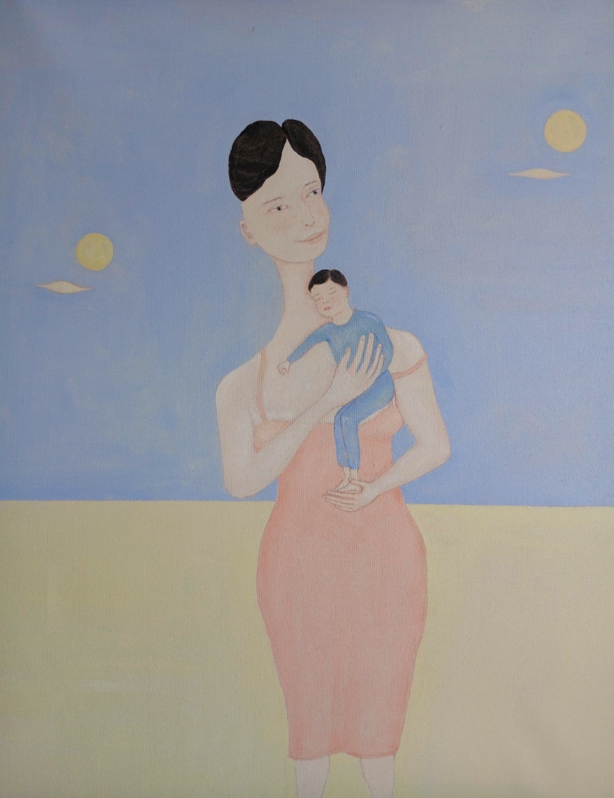 Ayu and her child in her arms