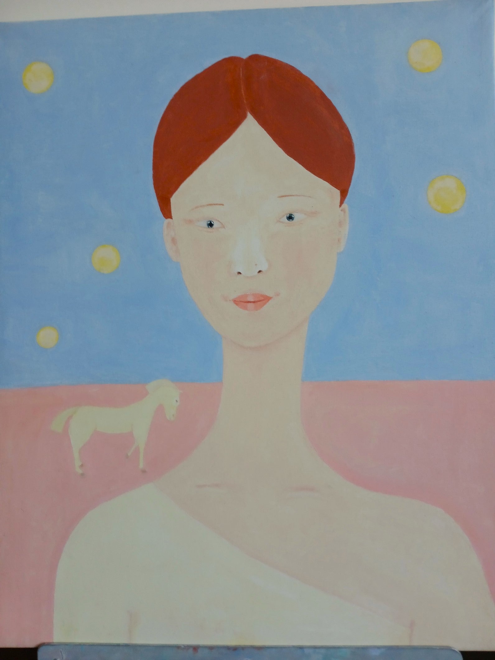 A young girl with a sincere face and her horse