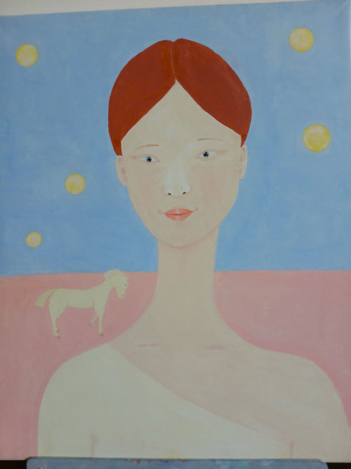 A young girl with a sincere face and her horse