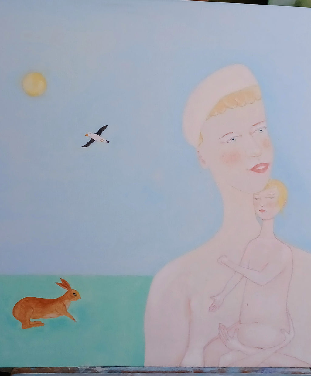 Mother and child in her arms