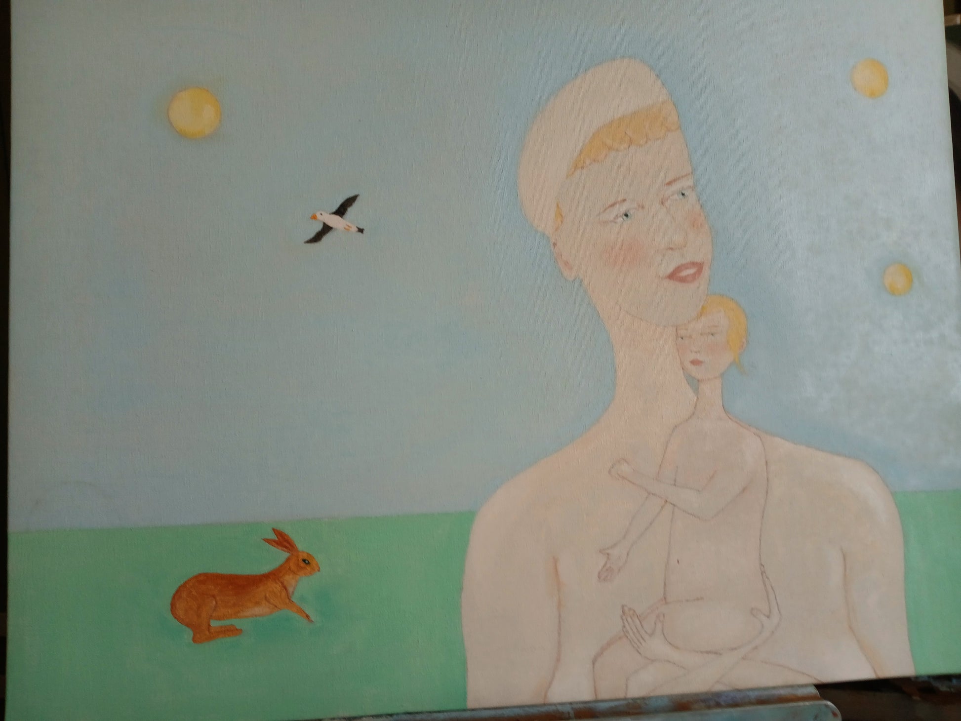 Mother and child in her arms